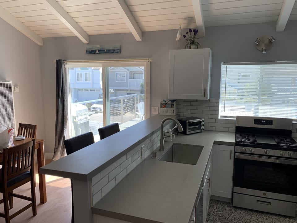 Eating area and doorway leading to deck