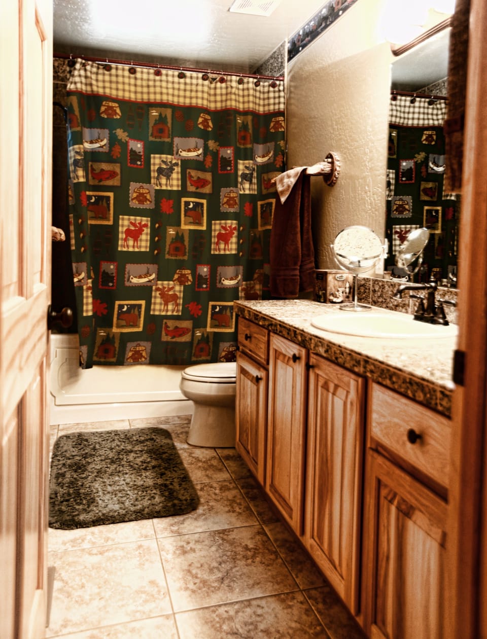 Upstairs Bathroom with Dual Vanity and Jacuzzi Tub/Shower