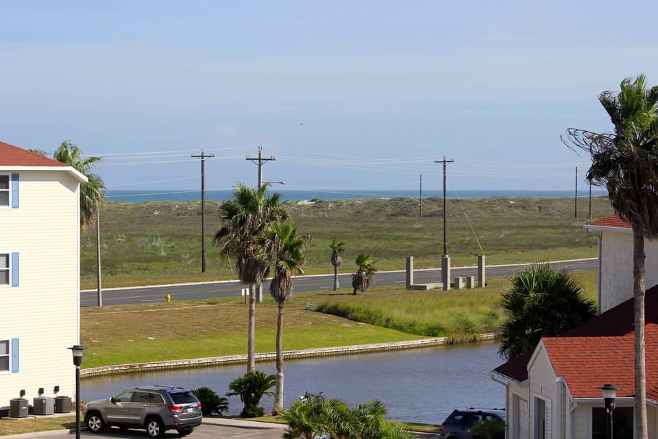View from balcony toward right.  Partial view of condo salt lake.