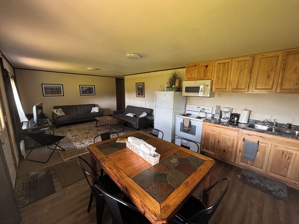 downstairs living, dining, and kitchen