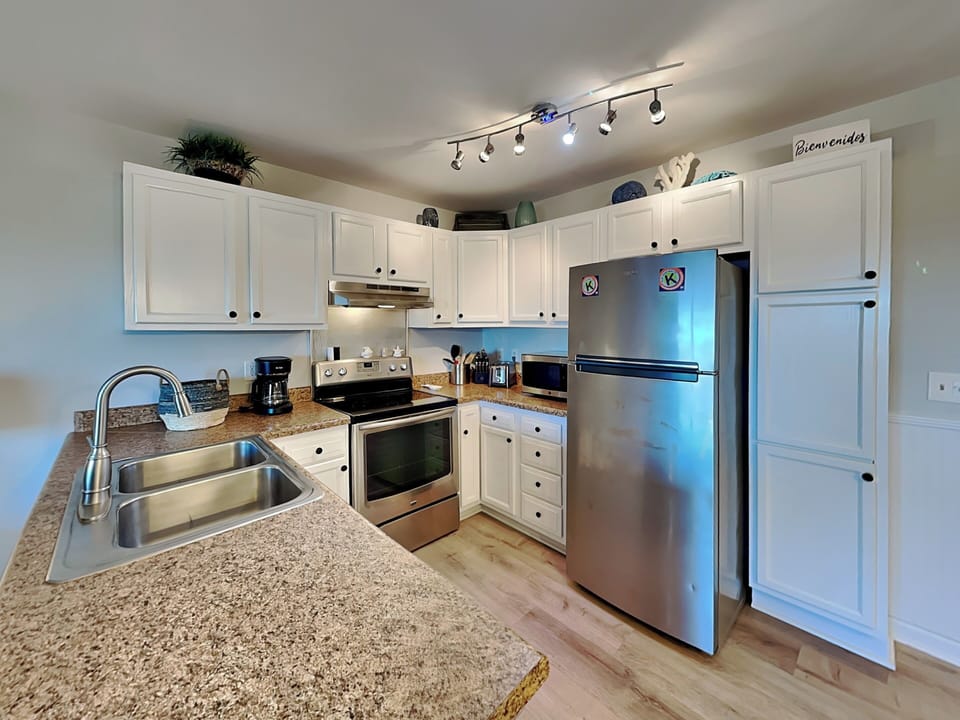 Fully Equipped Kitchen with Stainless Steel Appliances