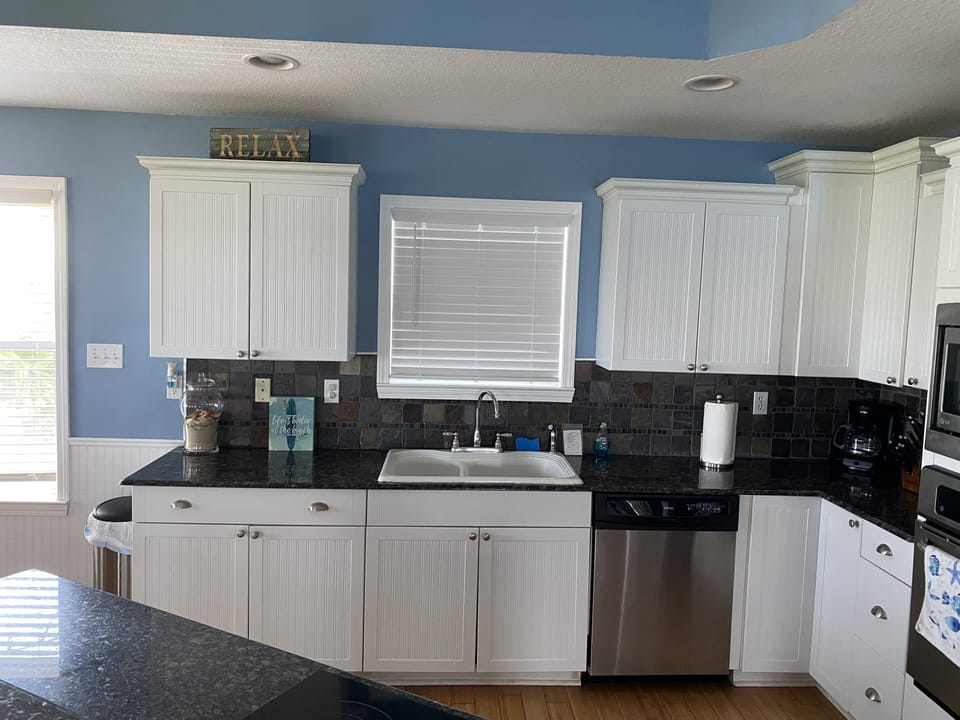Beautiful, spacious kitchen with granite countertops and fully stocked.
