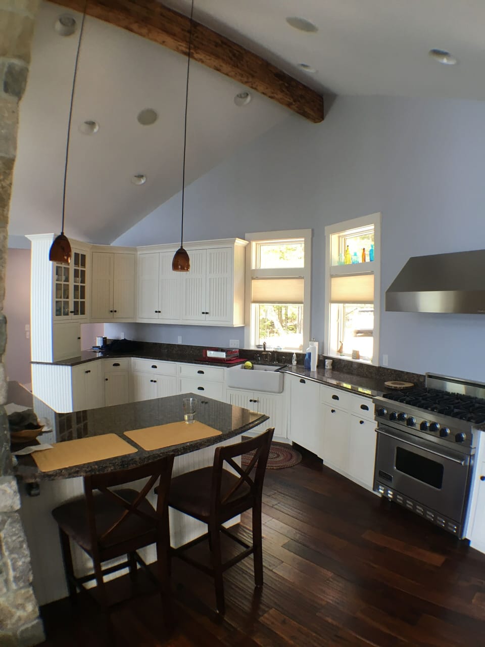 Kitchen includes additional counter seating at the large island