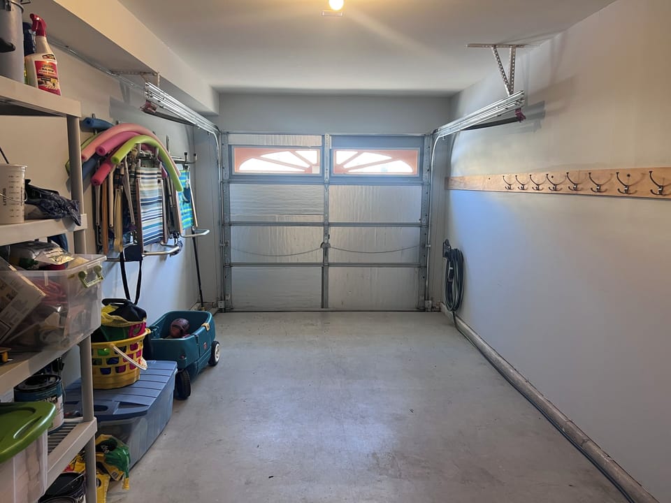 Garage space for gear and hooks for drying towels.