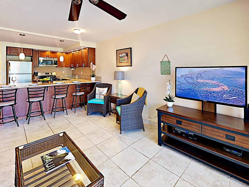 Living Room - Large windows let in the Maui sun and keep this living room bright and airy