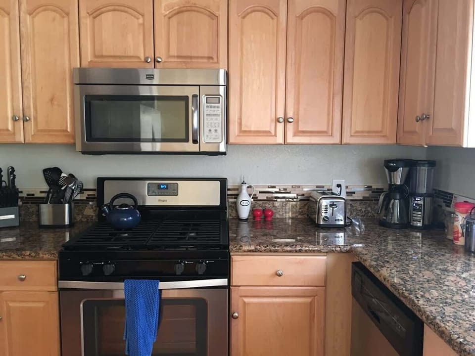 Gas range and microwave. Fully stocked kitchen with everything you need including coffee creamer and sugar plus more for guest