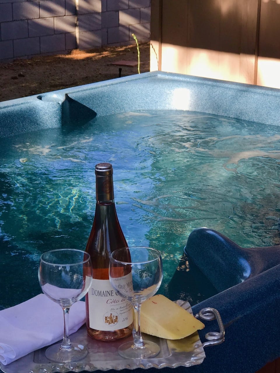 Wine and cheese in your own private jacuzzi 
