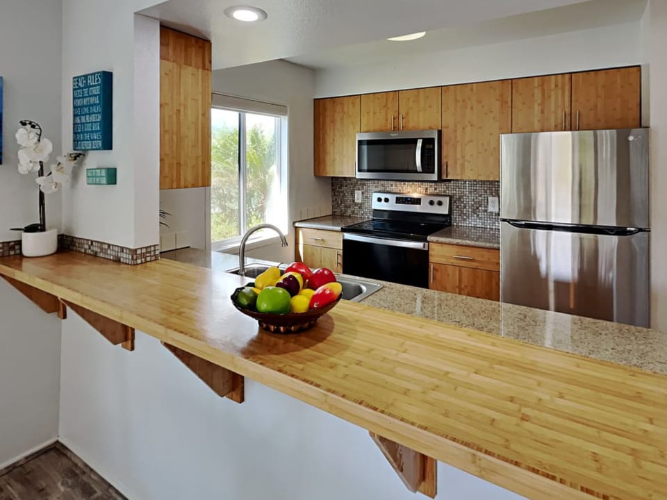 A chef's dream kitchen featuring high-end finishes and plenty of prep space.