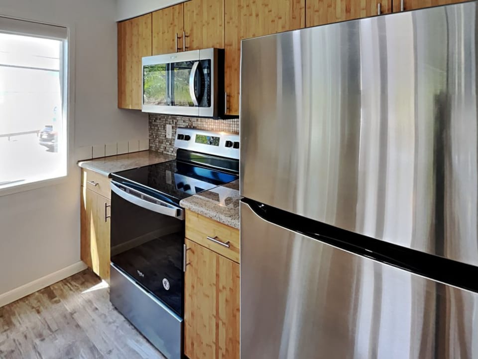 Modern elegance meets functionality in this open kitchen with stunning details.
