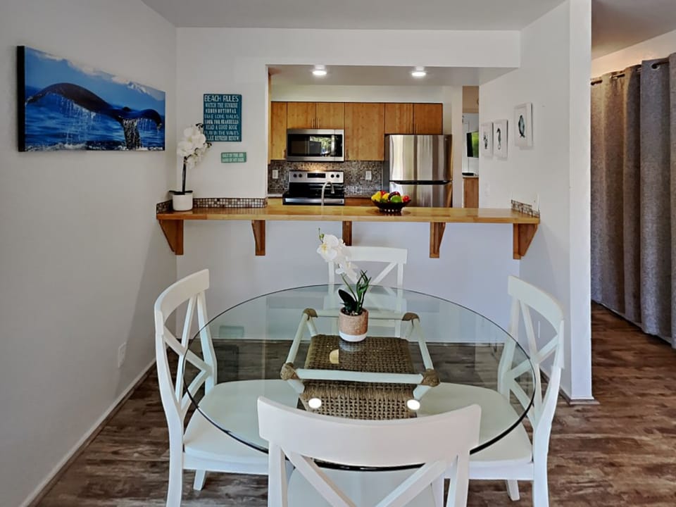 Gather around this stylish dining table perfect for savoring local Hawaiian flavors.