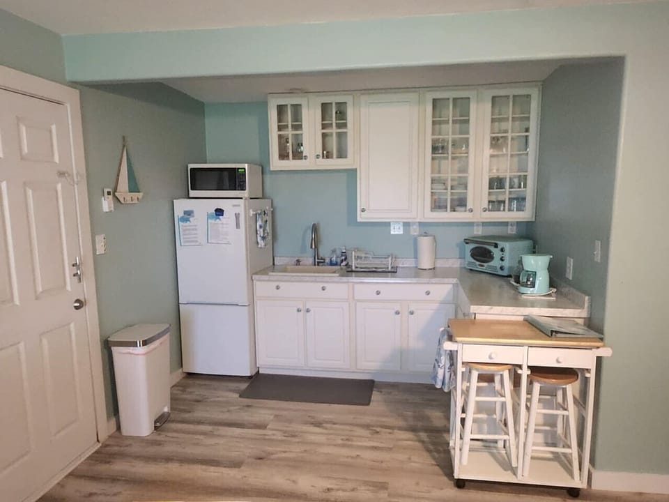 Beautiful Kitchen with Toaster Oven, Microwave, Full refrigerator