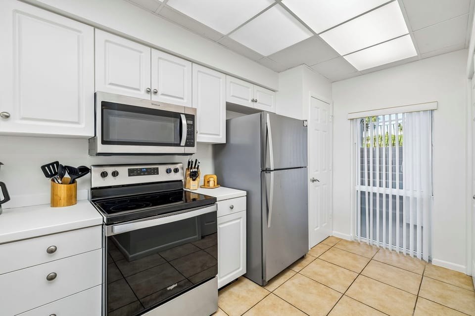 Fully Equipped Kitchen Offering Stainless Steel Appliances