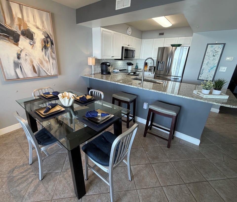 Play games or serve a nice lunch in our stylish dining area. Seating for 6.