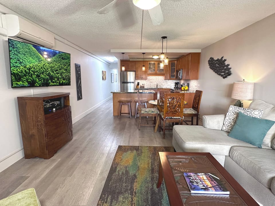 Experience island comfort in this stylish living room, where Hawaiian-inspired decor and cozy furnishings invite you to unwind in paradise.