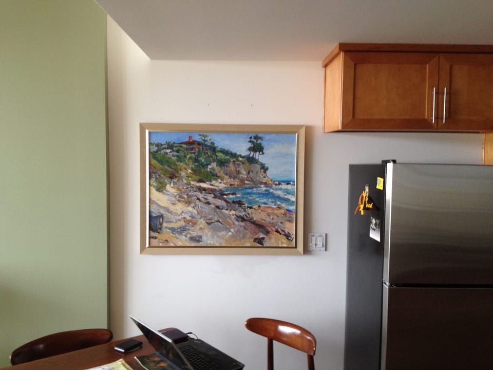 Original Plein Air So Cal coastal art in dining area