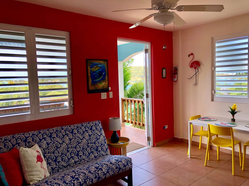 LIVING/DINING AREA WITH FUTON AND SEATING FOR 2