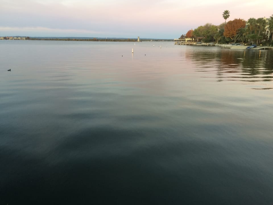 Early evening Lake LBJ view from downstairs (lake level) patio/dock in HSB Texas