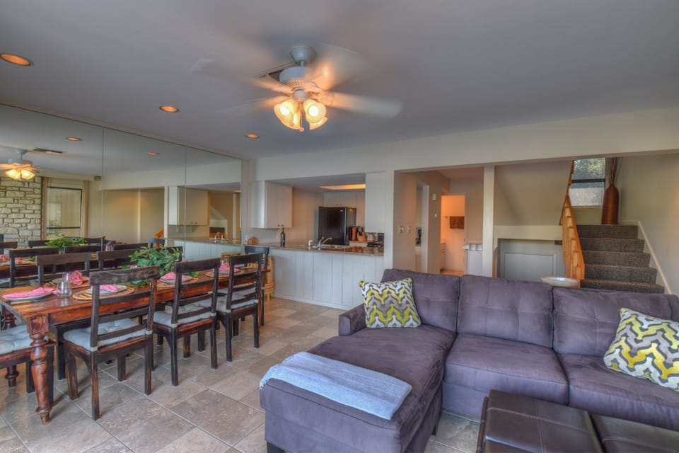 Middle level open floorplan living, dining, kitchen & fireplace in Horseshoe Bay