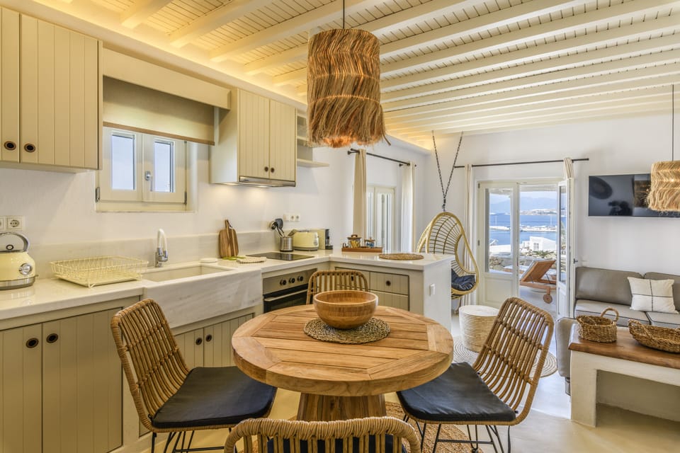 Living room, open space kitchen and dining area