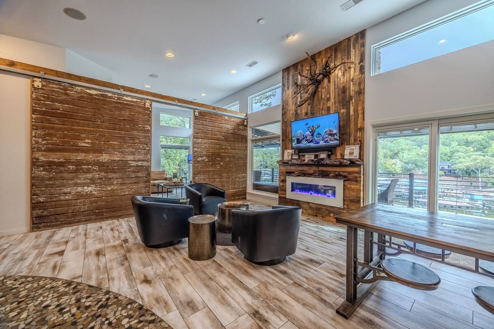 Cozy living area with rustic charm and scenic views, perfect for relaxation.