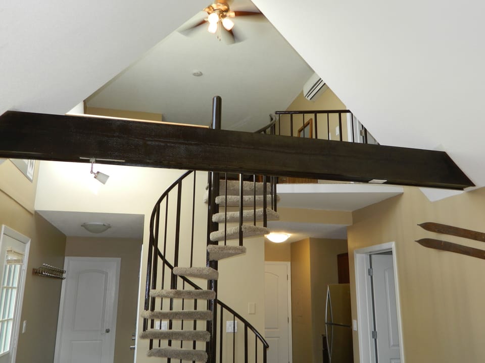 spiral staircase to loft and 2nd bedroom