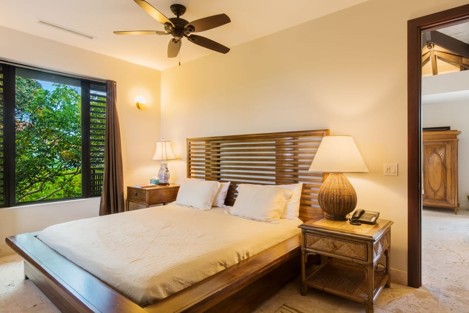 Spacious super-king suite with wardrobe and en-suite.