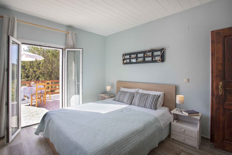 Dream and relax. Joleni Cottage main bedroom with access to the sun terrace.