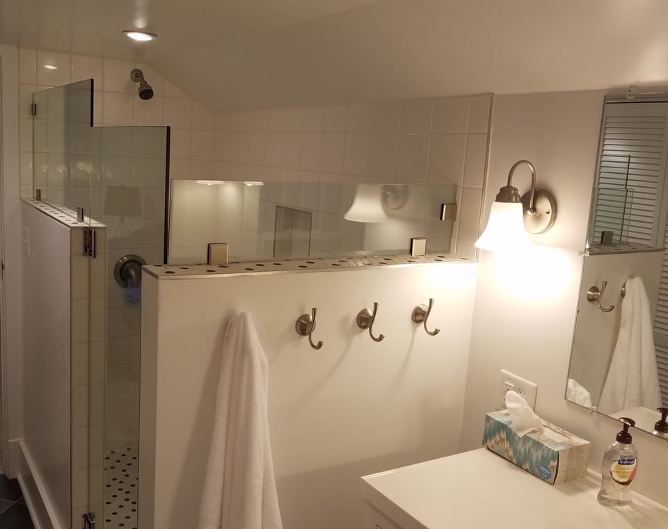 2nd floor full bath with tiled shower.
