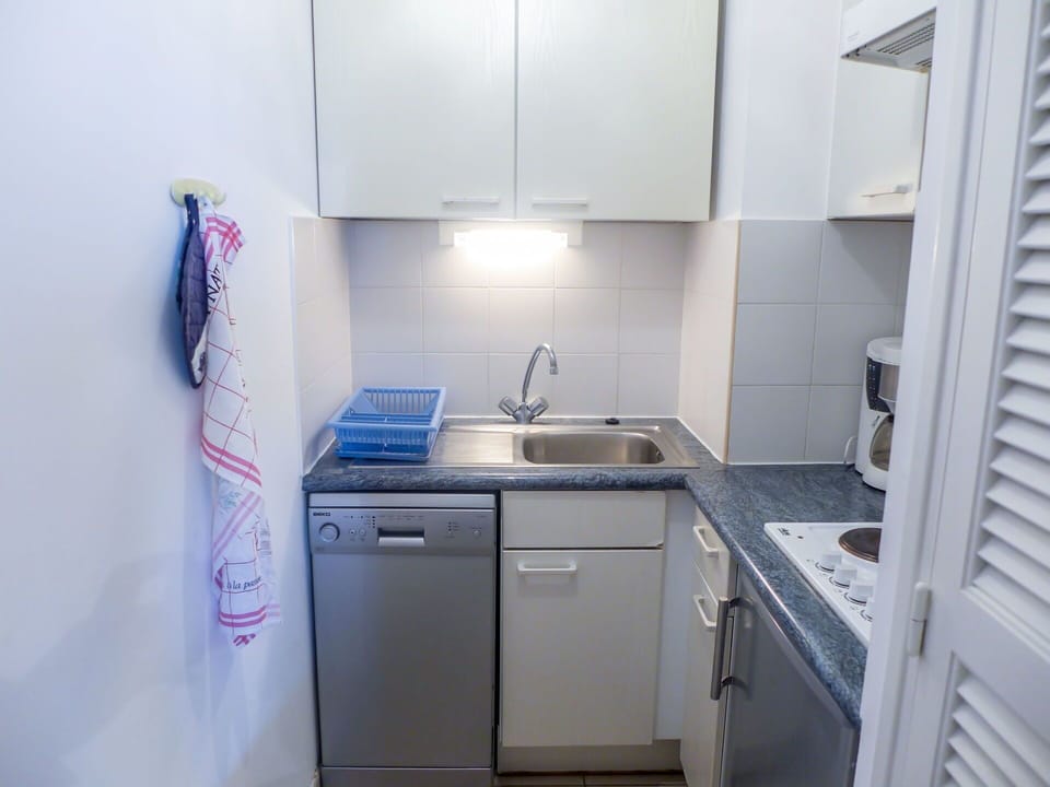 Property, Room, Cabinetry, Furniture, Kitchen, Major Appliance, Interior Design, Architecture, House, Sink