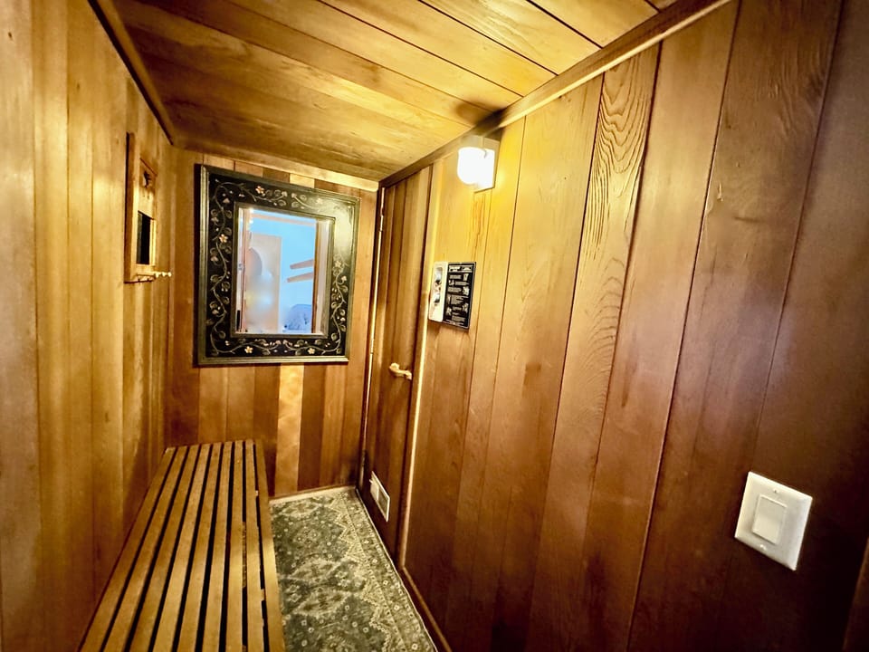 SAUNA: Entrance to sauna relaxation  cool-down/relaxation bench
