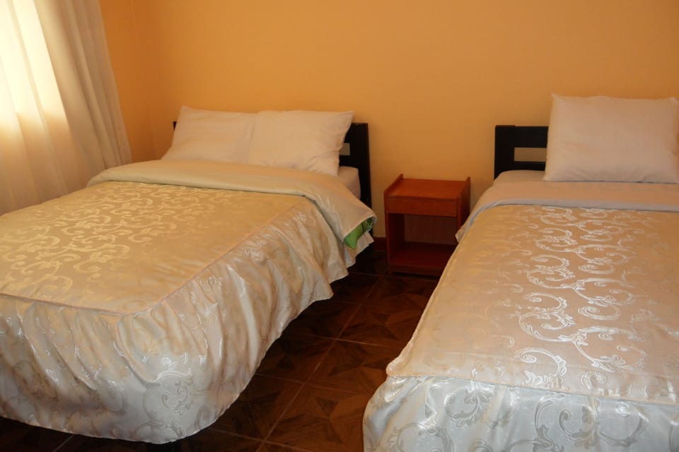 Standard Room, Multiple Beds, Non Smoking, Private Bathroom | Blackout drapes, soundproofing, free WiFi