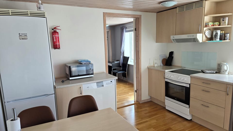 Family Apartment, Non Smoking, Garden View | Private kitchen | Fridge, microwave, oven, stovetop