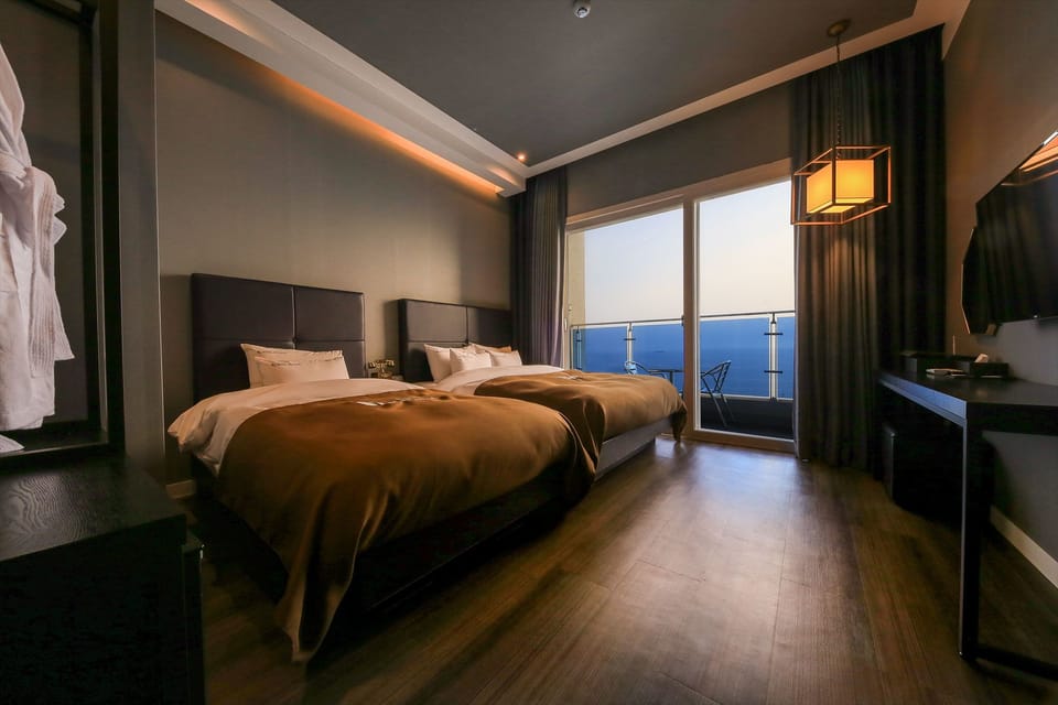 Premium bedding, down comforters, blackout drapes, soundproofing