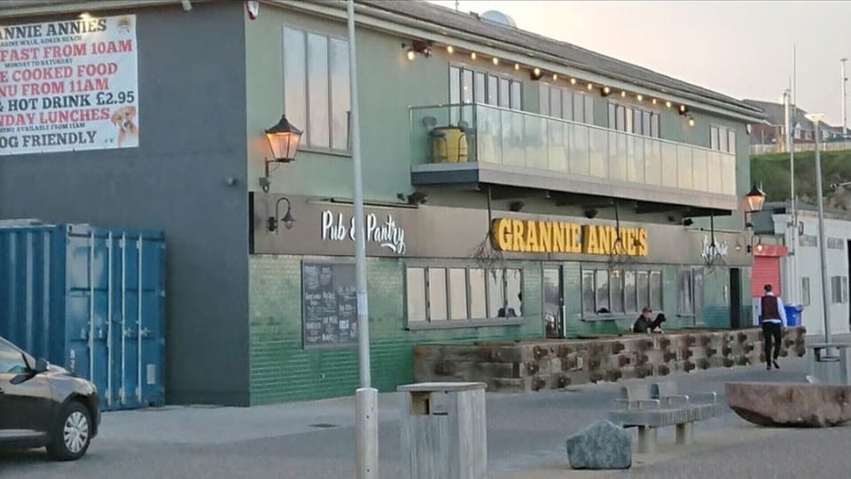Grannie Annies. 3/4 mins walk. On promenade below flats.