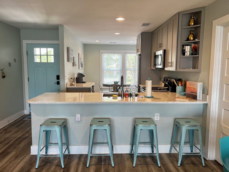 Fully equipped kitchen, full size and beverage refrigerators. 