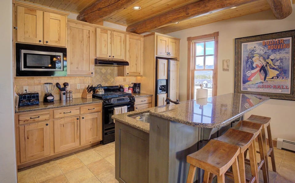 Kitchen island with stools