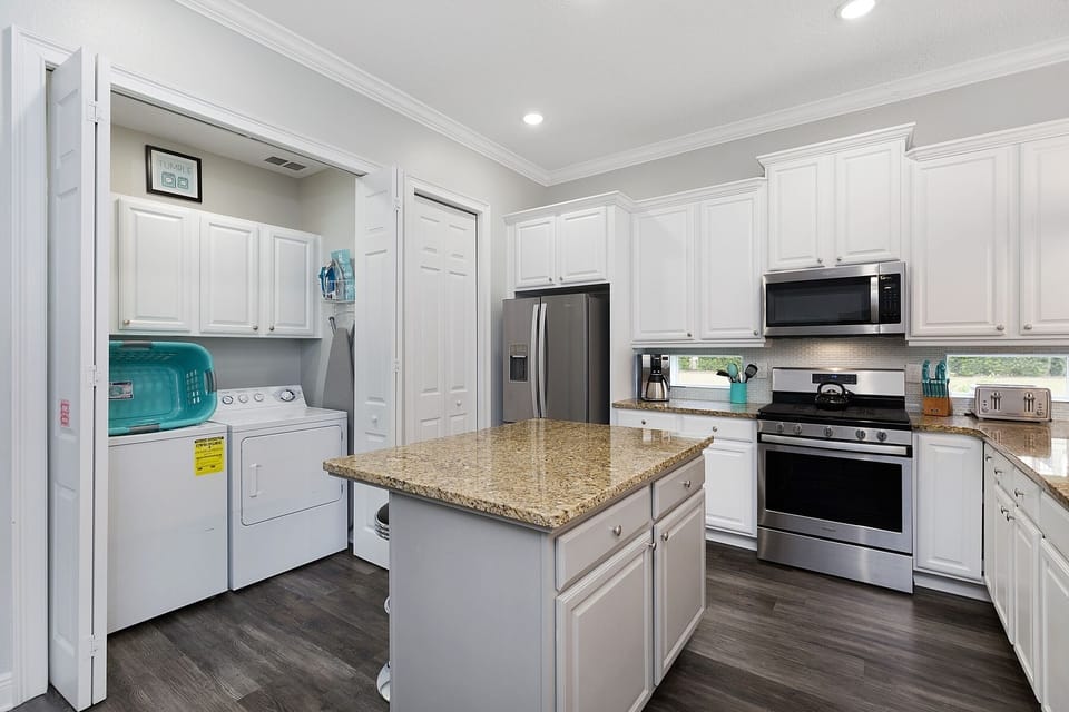 Washer and dryer located in the kitchen