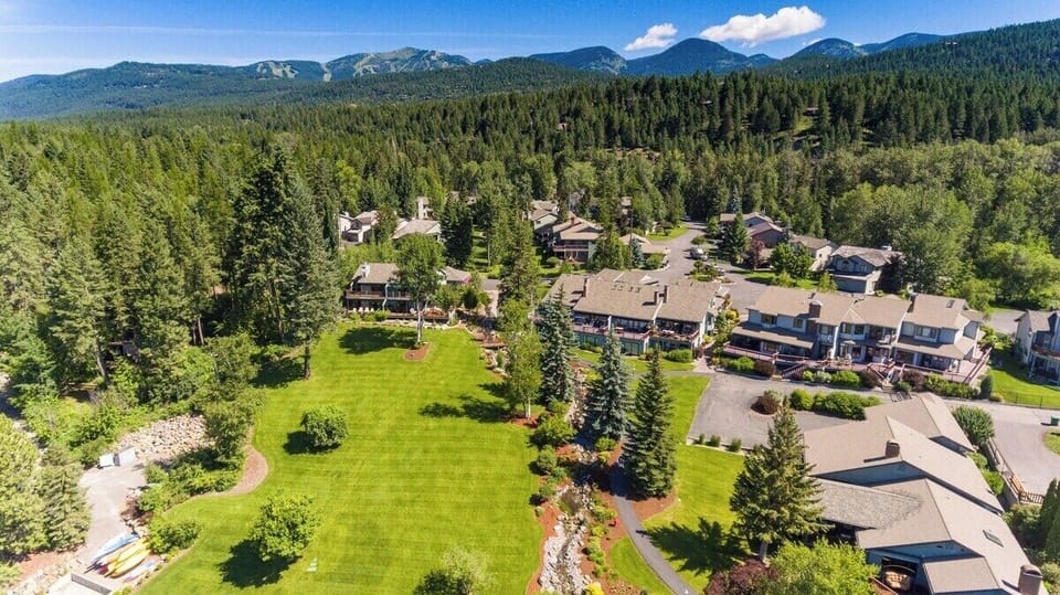Long sweeping lawn to the Private beach at Mountain Harbor on Whitefish Lake