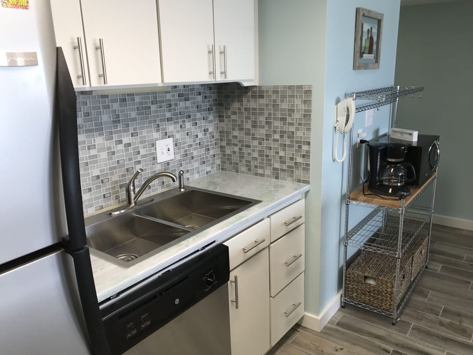 Remodeled kitchen with new stainless appliances and quartzite countertops!
