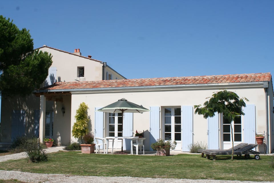 The Cottage. Relax and dine in the sunshine