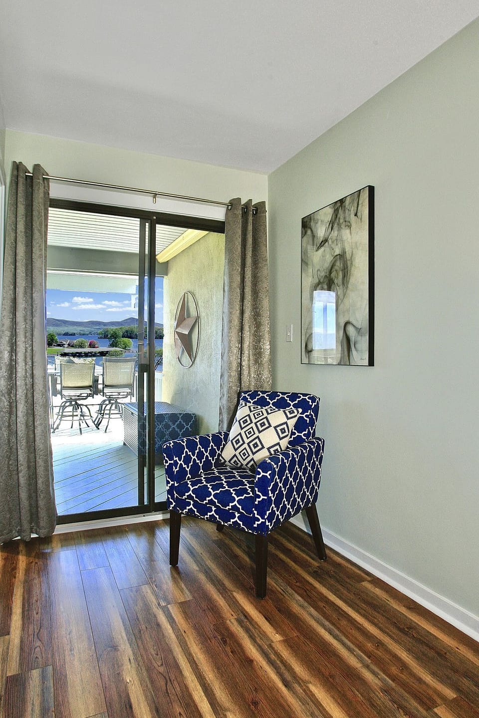 Master sitting area with private deck entry and views