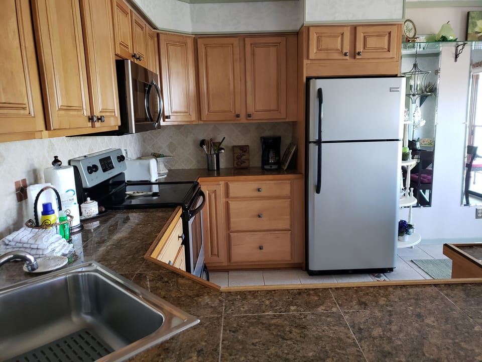 Fully stocked.  Start up paper towels/soaps.  Dishwasher, stove w glass top