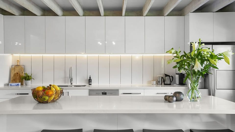 Enjoy cooking in our modern kitchen, boasting sleek countertops and state-of-the-art appliances.