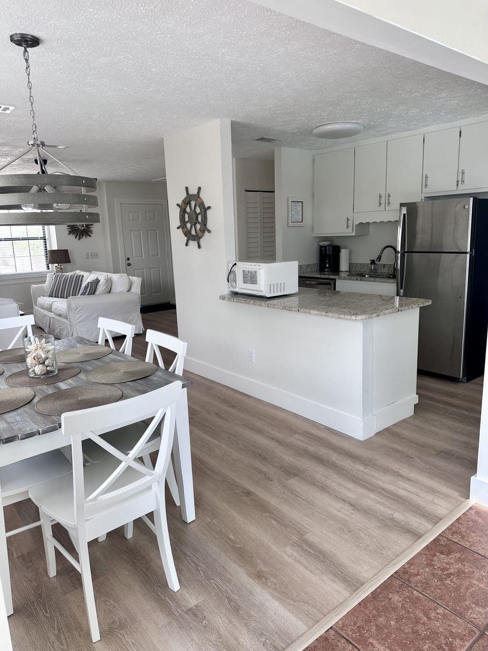 Large kitchen island is perfect for cooking and serving snacks and meals.