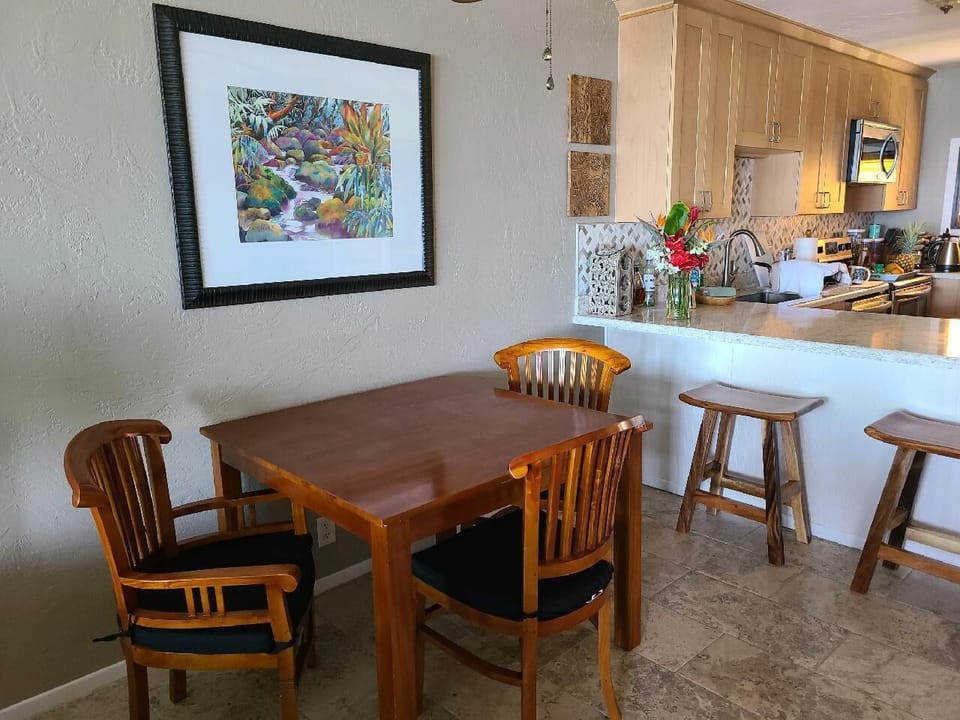 Dining table against wall for more room if desired.