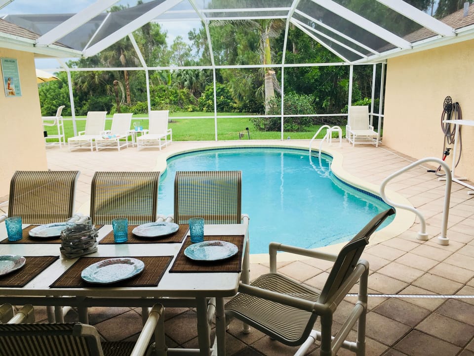 pool area with al fresco dining (seats 8)