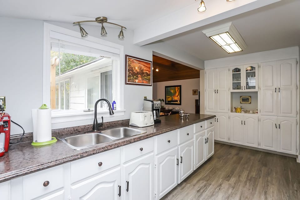 All freshly painted new faucet. Lots of counter space all easy to clean.