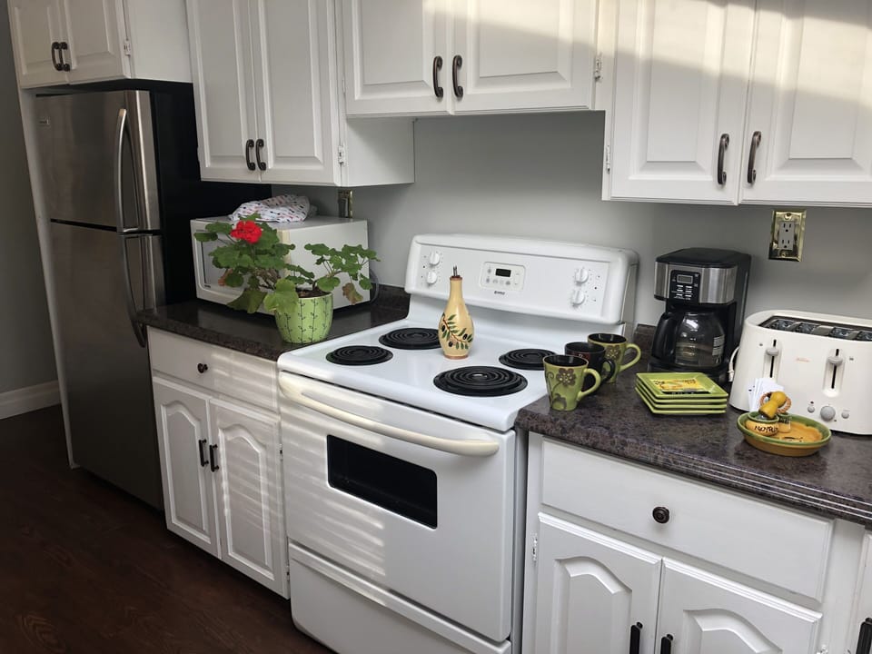 A joy of a kitchen with loads of natural light.Skylight too !!!, NEW STOVE Now.
