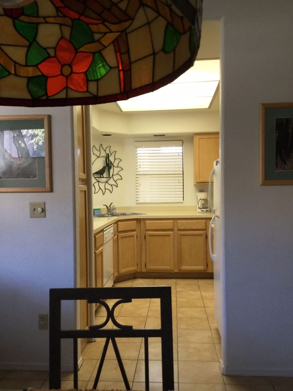 View of kitchen from dining table