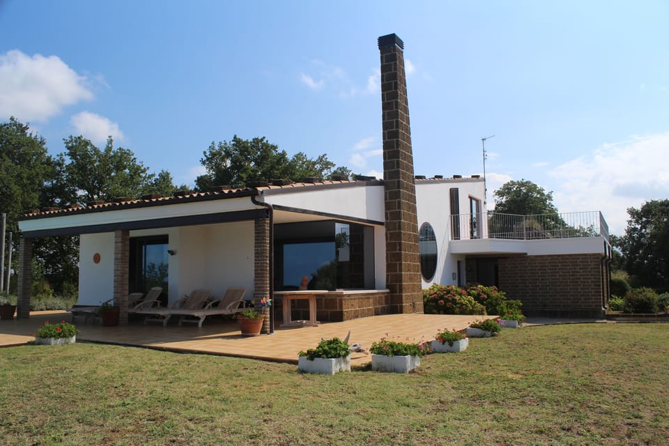 Relax under the shade of the front terrace.